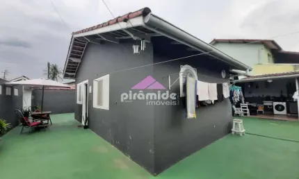 Casa com 3 dormitórios à venda, 107 m² por R$ 500.000,00 - Travessão - Caraguatatuba/SP
