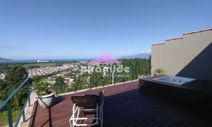Casa com 3 dormitórios à venda, 146 m² por R$ 980.000,00 - Getuba - Caraguatatuba/SP