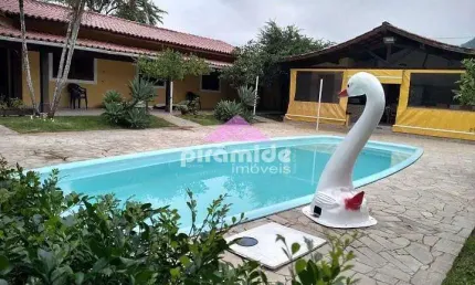 Casa com 6 dormitórios à venda, 700 m² por R$ 1.200.000,00 - Massaguaçu - Caraguatatuba/SP