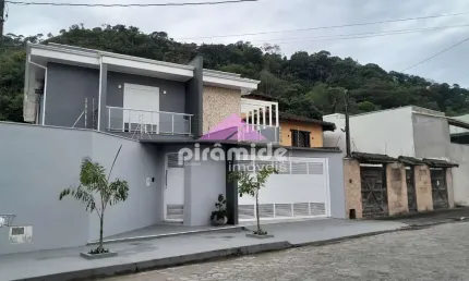 Casa com 5 dormitórios à venda, 373 m² por r$ 1.690.000,00 - sumaré - caraguatatuba/sp