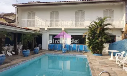 Casa com 5 dormitórios à venda, 393 m² por R$ 2.500.000,00 - Indaiá - Caraguatatuba/SP