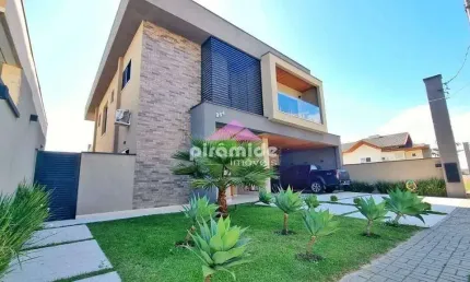 Casa com 4 dormitórios à venda, 400 m² por r$ 4.100.000,00 - condomínio residencial jaguary - são j