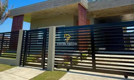 Casa com 3 quartos à venda na Minuano, 100, Curumim, Capão da Canoa por R$ 1.380.000