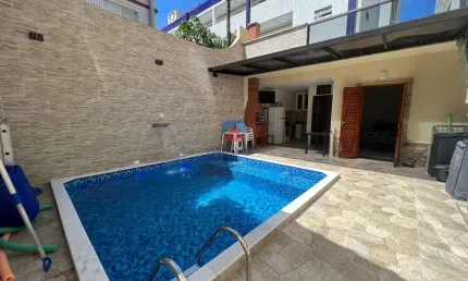 Casa com 3 quartos, Caiçara, Praia Grande - R$ 1.1 mi, Cod: 69237564