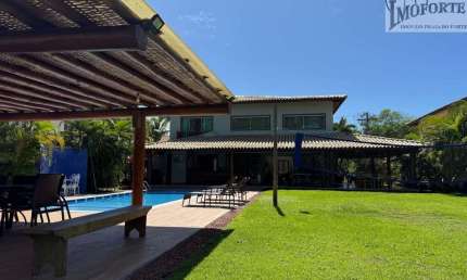 Linda Casa 4 suítes, em condomínio frente mar bem próximo da Vila !