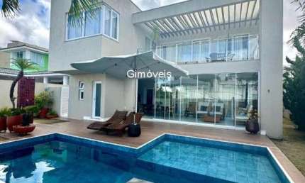Casa em condomínio fechado com 4 quartos à venda na RODOVIA RODOVIA BA-099  ESTRADA DO CÔCO, 20, Alphaville (Abrantes), Camaçari, 306 m2 por R$ 2.650.000