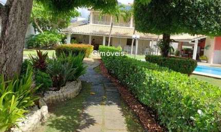 Casa em condomínio fechado com 5 quartos à venda na Rua João Marques Oliveira, Buraquinho, Lauro de Freitas, 397 m2 por R$ 1.680.000
