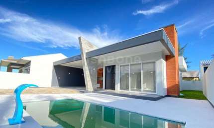 Casa com 3 quartos à venda na Avenida Medeiros de Quadros, 42, Balneário São Jorge, Arroio do Sal, 138 m2 por R$ 850.000