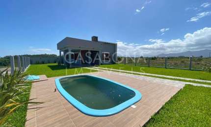 Casa com 3 quartos à venda na Rua Lindoia, Jardim Raiante, Arroio do Sal, 96 m2 por R$ 640.000