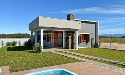 Casa com 3 quartos à venda na Rua Lindoia, Jardim Raiante, Arroio do Sal, 96 m2 por R$ 640.000