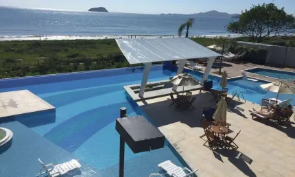 Bali Beach - Semimobiliado com 2 dormitórios e vista mar