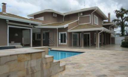 Casa de alto padrão em condomínio no Loteamento Alphaville Campinas para locação: 4 quartos, 4 suítes, 3 salas, 6 banheiros, 4 vagas e 600m².