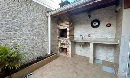 Casa com 4 dormitórios à venda, 238 m² por R$ 990.000,00 - Jardim Três Marias - Guarujá/SP