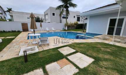 Casa com 7 dormitórios, 628 m² - venda por R$ 7.800.000,00 ou aluguel por R$ 26.000,00/mês - Acapulco - Guarujá/SP