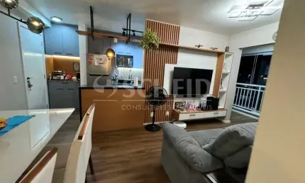 Apartamento de dois quartos uma suite e uma vaga de garagem