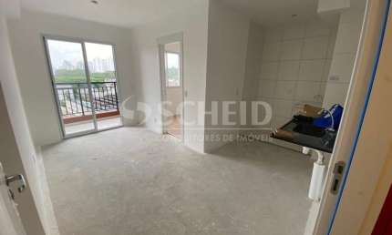 Apartamento novo com 2 quartos, varanda e vaga de garagem.