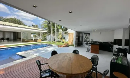Casa térrea nova com 710m2 a.c. e 1.390m2 a.t.  4 dorms - 3 suítes - aquecimento solar
