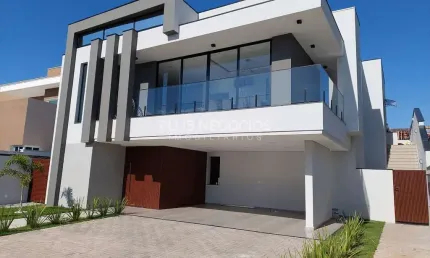 Casa à Venda e Locação no Condomínio Alphaville 3: 4 Suítes, 310m² de Área Útil, Ambientes Amplos,