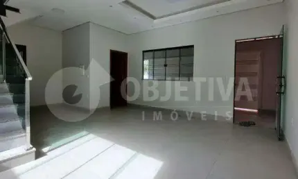 Excelente casa duplex estilo sobrado a venda no bairro Santa Mônica em Uberlândia