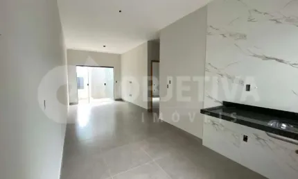Ótima casa estilo geminada a venda no bairro Jardim Ipanema Em Uberlândia