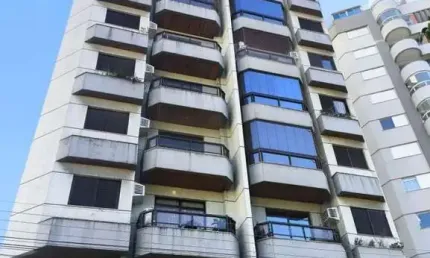 Apartamento 4 dormitórios sendo 2 suítes, com vaga de garagem no centro