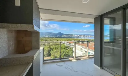 Apartamento novo com 3 suítes, sacada e vista para o mar - Cacupé, Florianópolis/SC