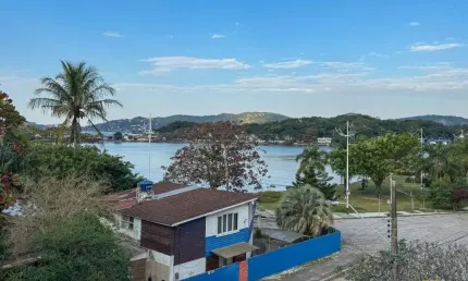 Apartamento com 3 suítes, 2 vagas, hobby box e vista para a Lagoa - Lagoa da Conceição, Florianópoli