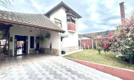 Casa com 4 quartos para alugar na Rua Aratas, 285, Estância Balneária Maria Helena Novaes, Peruíbe
