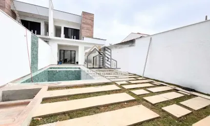 Sobrado frente à praia à venda em Itanhaém-SP, Bopiranga: 3 quartos, 3 suítes, 2 salas, 4 banheiros, 3 vagas de garagem, 90m² de área.