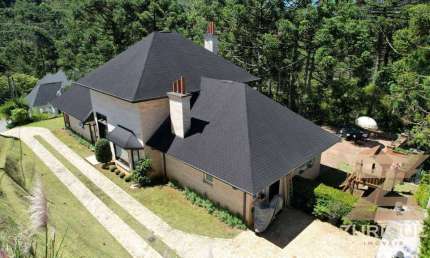 Casa com 4 dormitórios à venda, 315 m² por R$ 3.700.000,00 - Condomínio Recanto do Sol - Campos do Jordão/SP