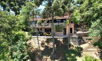 Casa com 4 dormitórios à venda, 275 m² por R$ 1.500.000,00 - Alto da Vila Inglesa - Campos do Jordão/SP