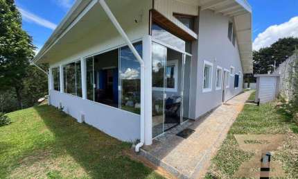 Casa com 5 dormitórios à venda, 315 m² por R$ 1.900.000,00 - Vila Natal - Campos do Jordão/SP
