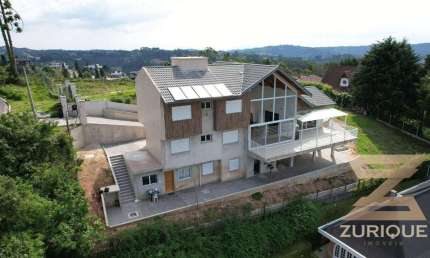 Casa com 4 dormitórios à venda, 330 m² por R$ 3.000.000,00 - Alto Do Capivari - Campos do Jordão/SP