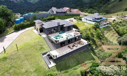 Casa com 5 dormitórios à venda, 448 m² por R$ 6.900.000,00 - Vila Medica - Campos do Jordão/SP