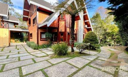 Casa com 5 dormitórios à venda, 424 m² por R$ 3.900.000,00 - Condomínio Residencial Jardim Véu da Noiva - Campos do Jordão/SP
