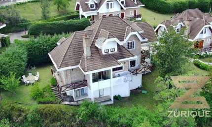 Casa com 5 dormitórios à venda, 300 m² por R$ 1.600.000,00 - Alataia - Campos do Jordão/SP