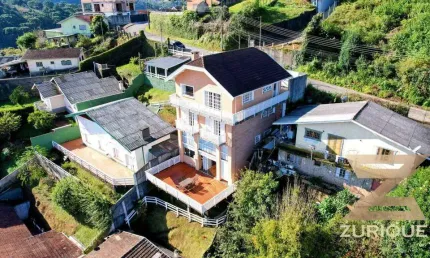 Casa com 5 dormitórios à venda, 227 m² por R$ 1.500.000,00 - Vila Telma - Campos do Jordão/SP