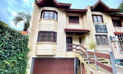 Casa com 4 dormitórios para alugar, 350 m² por R$ 9.000,00/mês - Boa Vista - Por