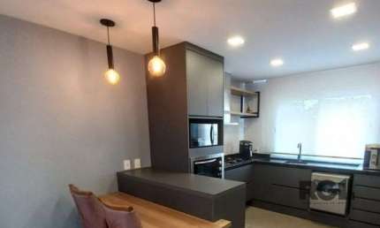 Casa em condomínio a venda no bairro Vila Nova, com 3 dormitórios.