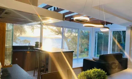 Casa para comprar para  quem ama a água e o pôr-do-sol!!