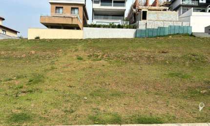 Terreno em aclive à venda, 490 m² por R$ 1.372.000 - Gênesis 2 - Santana de Parnaíba/SP