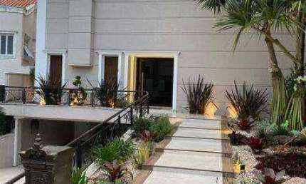Casa em Alphaville com 4 dormitórios à venda, 630 m² por R$ 3.990.000 - Alphaville - SP