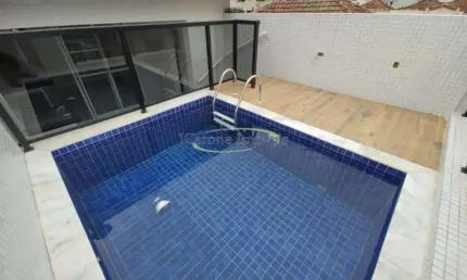 Venda de casa sobreposta alta com 3 suítes 2 vagas e piscina no embaré - santos / sp