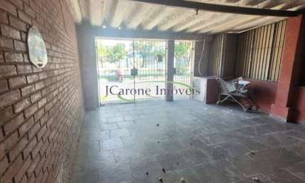 Casa Sobreposta Baixa para reforma com 4 quartos na Vila São Jorge em Santos / SP