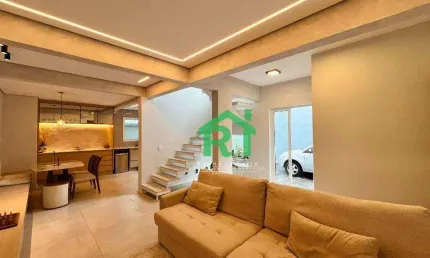Village com 2 dormitórios à venda, 126 m² por R$ 820.000,00 - Tombo - Guarujá/SP