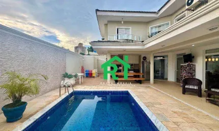 Casa com 3 quartos (1 suíte), 4 vagas e lazer à venda no Tombo, Guarujá | Rocha Imóveis Guarujá