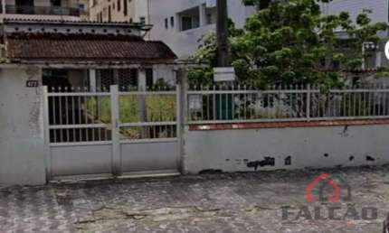 Terreno à venda na Rua Copacabana, 472, Guilhermina, Praia Grande por R$ 1.010.000