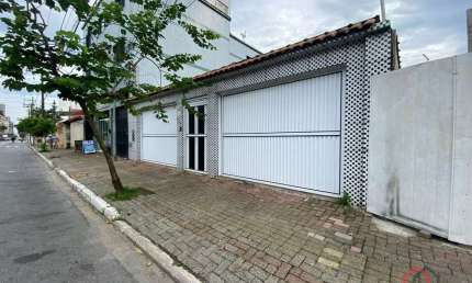 Casa com 4 quartos à venda na 31 de Março, 741, Nova Mirim, Praia Grande por R$ 770.001