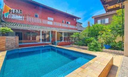Casa 4 dormitórios com 3 suítes à venda, 310 m² por R$ 1.100.000,00- Nova Mirim - Praia Grande/SP