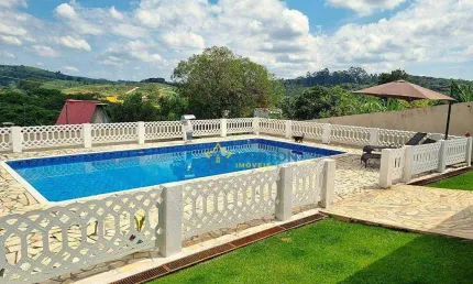 Chácara espaçosa à venda em caiocara, atibaia - 3 dormitórios com piscina e vista para o vale